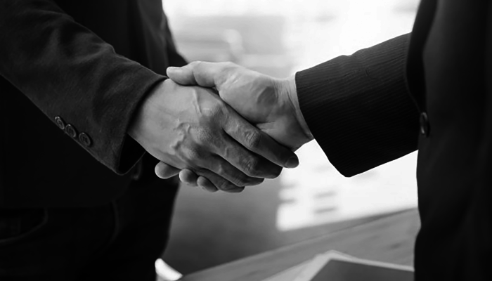 two-confident-business-man-shaking-hands-during-meeting-office-success-dealing-greeting-partner-concept_1423-185